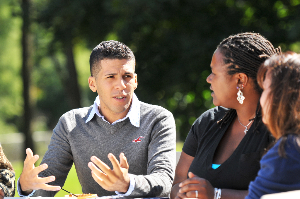 3- person discussion outdoors