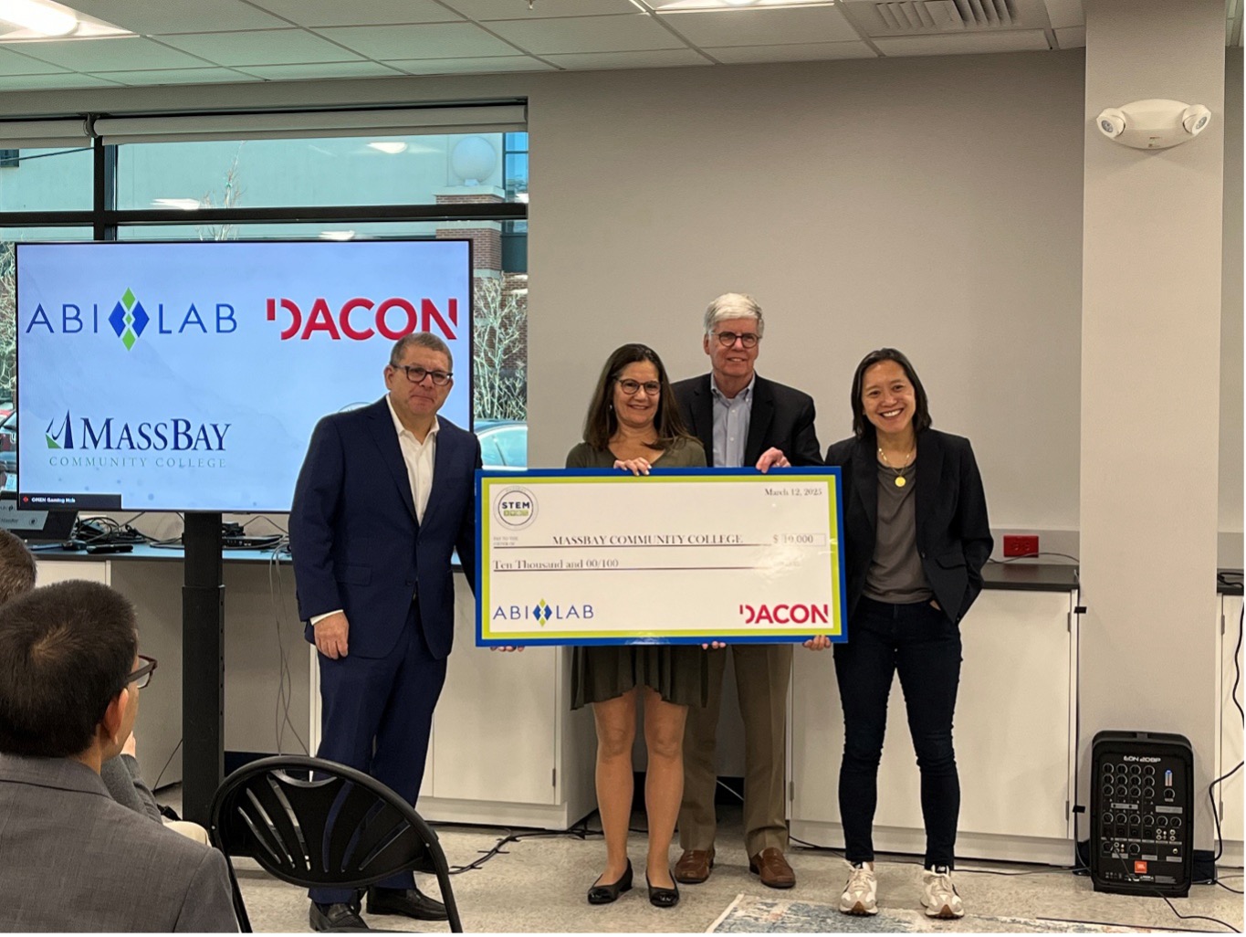 From left to right, ABI-LAB COO Gary Kaufman, Valerie Kapilow, Dacon Corporation COO Armand Souliere, and MA Secretary of Economic Development Yvonne Hao at ABI-LAB Natick
