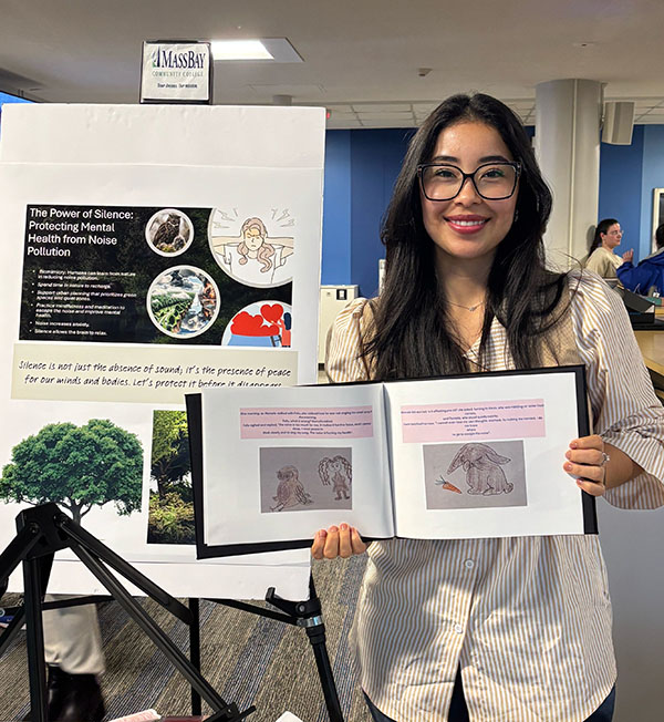 Lina Borda with the book she wrote