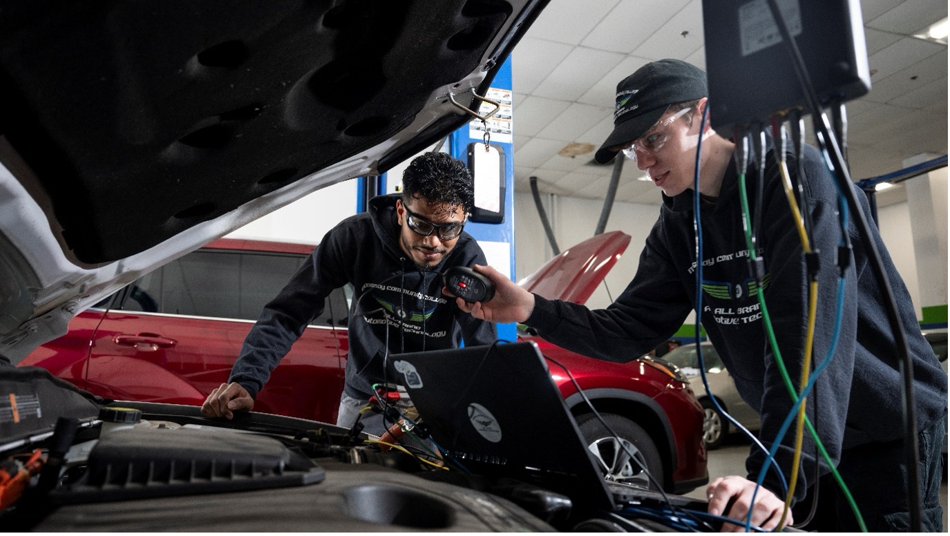 MassBay Automotive Students Do A Computer Test on a Car