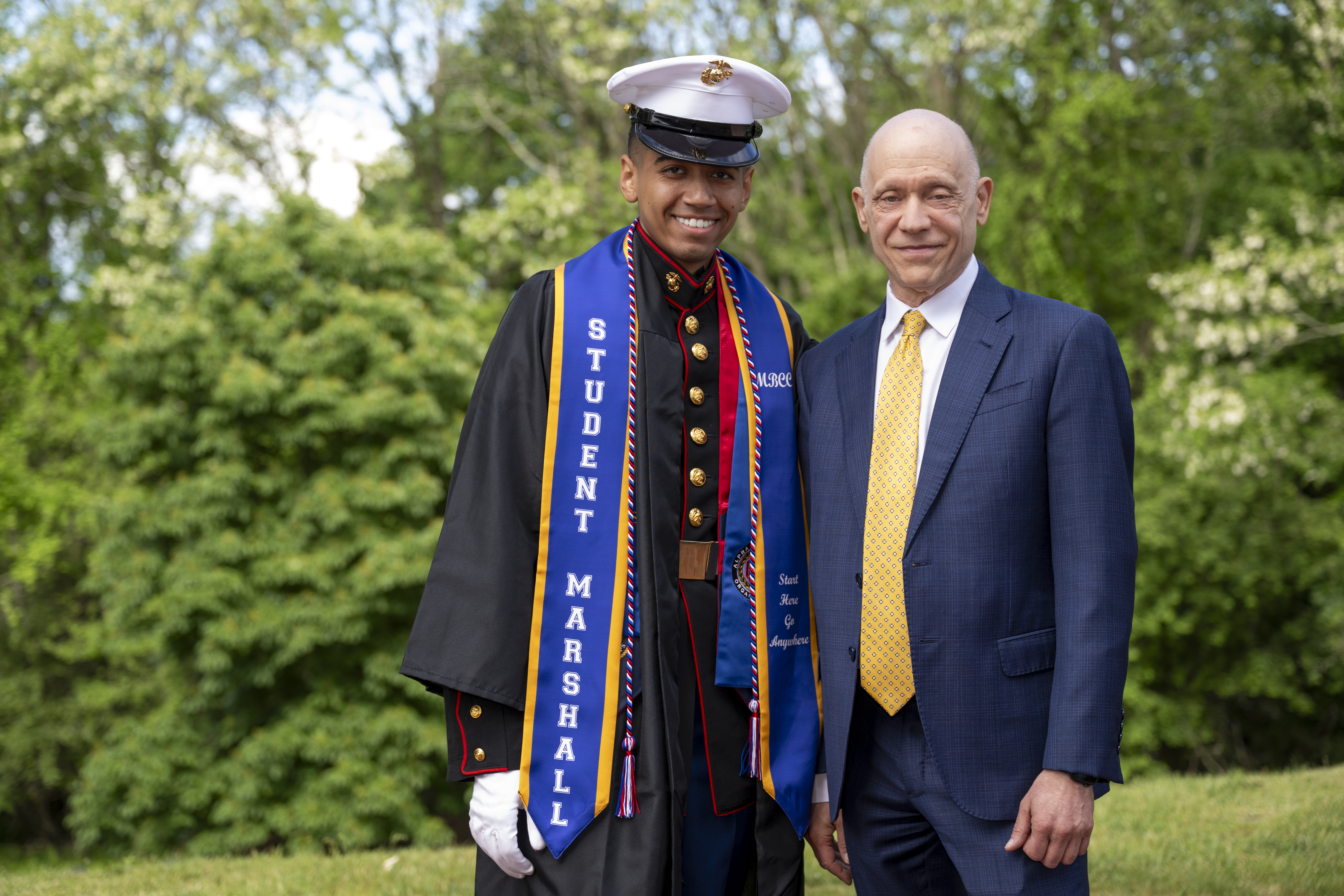Student Marshall and President Podell at Commencement 2026