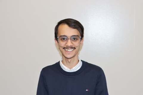 Headshot of a smiling M. Ahsan Fuzail 