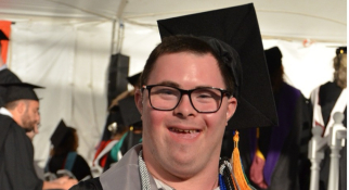 MassBay Student Henry Brill at Commencement